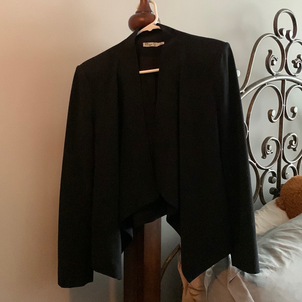 Black suit jacket with tapered sides